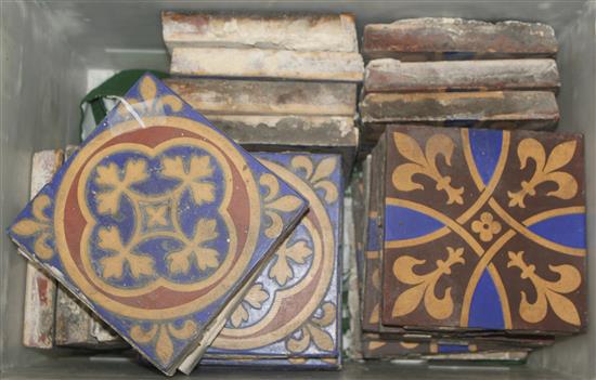 Twenty five Minton & Co encaustic floor tiles, 19th century, 15cm sq., old mortar